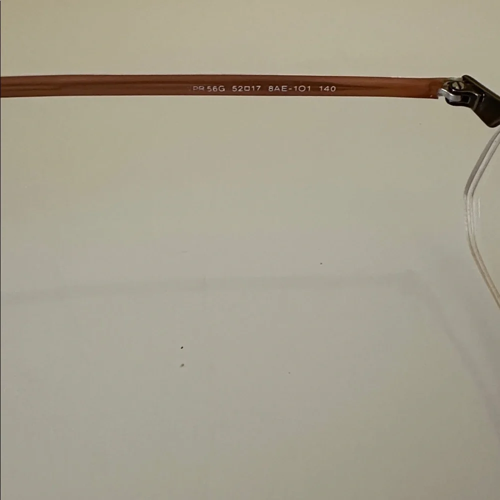 Prada Sleek Bronze Titanium Frameless Rectangular Prescription Glasses Frame